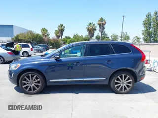 2015 Volvo XC60 T5 Drive-E Premier with VIN YV440MDK0F2685308, listed as a IAAI auction lot 42783695 with 140,561 mi miles and . Bid and sale history available at DreamBid. Image 14.