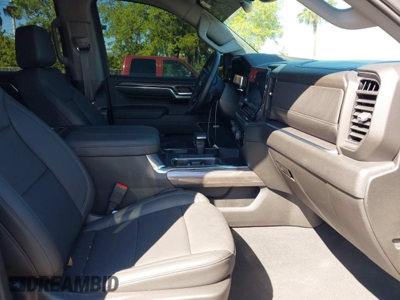 2024 Chevrolet Silverado 1500 LTZ with VIN 1GCUDGE81RZ298421, listed as a IAAI auction lot 41775039 with 6,900 mi miles and . Bid and sale history available at DreamBid. Image 5.
