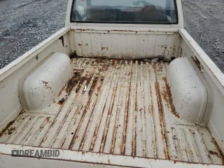 1986 Nissan Hardbody E z VIN JN6ND11S7GW014787, wystawiony jako Copart lot #45291425 z przebiegiem 171 557 mil mil oraz Szkody całkowita. Historia ofert i sprzedaży dostępna na DreamBid. Obrazek 10.