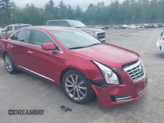 2013 Cadillac XTS Luxury z VIN 2G61R5S38D9229278, wystawiony jako IAAI lot #42321672 z przebiegiem 89 537 mil mil oraz . Historia ofert i sprzedaży dostępna na DreamBid. Obrazek 1.