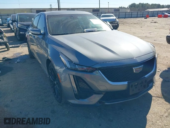 2021 Cadillac CT5 Sport z VIN 1G6DP5RK6M0128539, wystawiony jako IAAI lot #41418733 z przebiegiem 25 332 mil mil oraz . Historia ofert i sprzedaży dostępna na DreamBid. Obrazek 1.