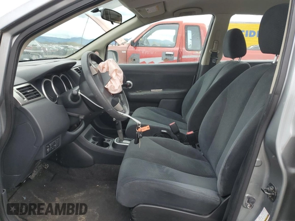 2010 Nissan Versa S with VIN 3N1BC1APXAL411429, listed as a Copart auction lot 50638725 with 95,893 mi miles and Salvage Title. Bid and sale history available at DreamBid. Image 7.