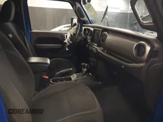 2021 Jeep Wrangler Unlimited Sport S with VIN 1C4HJXDN5MW717673, listed as a IAAI auction lot 42210527 with 35,635 mi miles and . Bid and sale history available at DreamBid. Image 5.