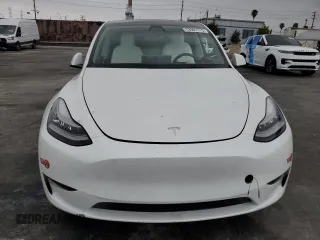 2021 Tesla Model Y Long Range with VIN 5YJYGDEEXMF151686, listed as a Copart auction lot 53903115 with 65,321 mi miles and Salvage Title. Bid and sale history available at DreamBid. Image 5.