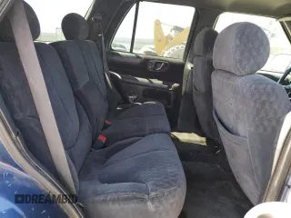 2001 GMC Jimmy SLE Rental Fleet z VIN 1GKDT13W212108144, wystawiony jako Copart lot #58753865 z przebiegiem 254 402 mil mil oraz Szkoda całkowita • Salvage title. Historia ofert i sprzedaży dostępna na DreamBid. Obrazek 11.