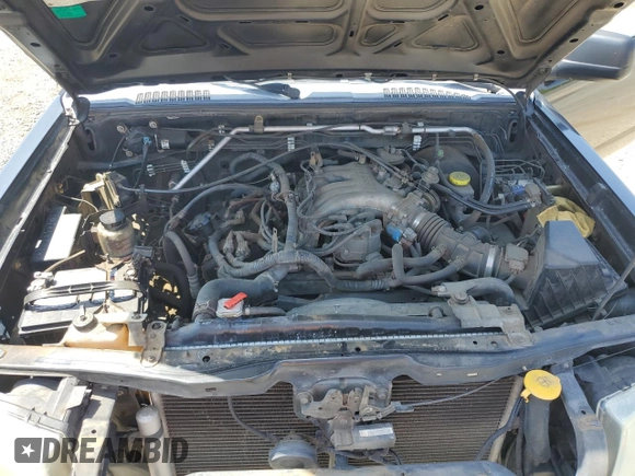 2004 Nissan Frontier XE with VIN 1N6ED27T84C446811, listed as a Copart auction lot 54988415 with 172,655 mi miles and Salvage title. Bid and sale history available at DreamBid. Image 11.