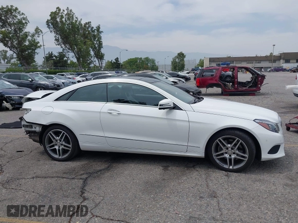 2014 Mercedes-Benz E 350 with VIN WDDKJ5KB5EF248191, listed as a IAAI auction lot 42355813 with 55,873 mi miles and . Bid and sale history available at DreamBid. Image 14.
