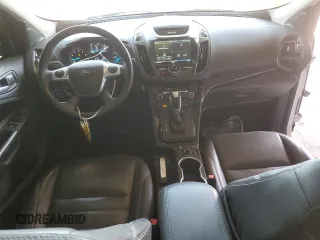 2015 Ford Escape Titanium with VIN 1FMCU9J96FUB33670, listed as a Copart auction lot 61826915 with 179,794 mi miles and Salvage title. Bid and sale history available at DreamBid. Image 8.