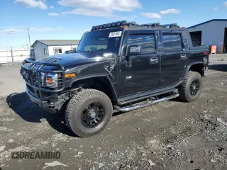 2005 Hummer H2 SUT with VIN 5GRGN22U55H112442, listed as a Copart auction lot 86158414 with 135,411 mi miles and Salvage Title. Bid and sale history available at carsss.com. Image 1.