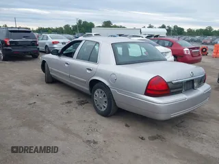 2006 Mercury Grand Marquis GS z VIN 2MEFM74V16X646802, wystawiony jako IAAI lot #42358697 z przebiegiem 169 321 mil mil oraz . Historia ofert i sprzedaży dostępna na DreamBid. Obrazek 3.