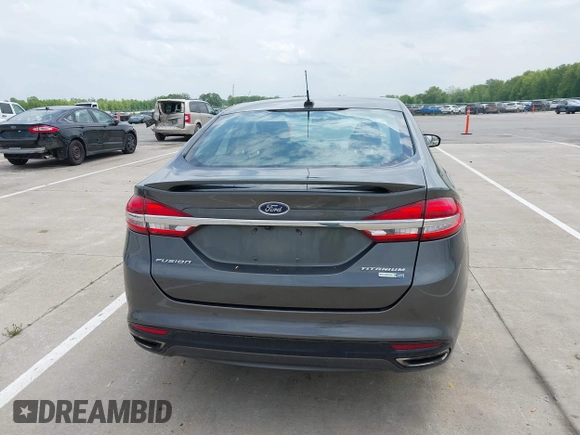 2017 Ford Fusion Titanium with VIN 3FA6P0D93HR261526, listed as a IAAI auction lot 42277350 with 117,388 mi miles and . Bid and sale history available at DreamBid. Image 16.