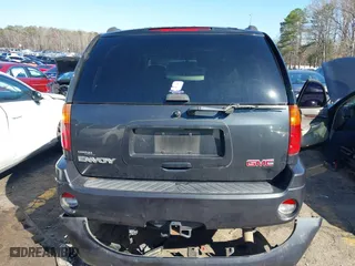 2005 GMC Envoy SLE with VIN 1GKDS13S252305661, listed as a IAAI auction lot 41751800 with 235,090 mi miles. Bid and sale history available at carsss.com. Image 16.
