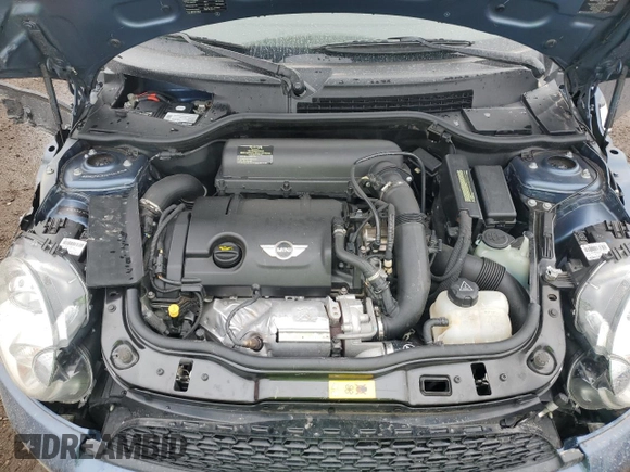 2011 MINI Convertible S z VIN WMWZP3C52BTX84305, wystawiony jako Copart lot #59586995 z przebiegiem 36 217 mil mil oraz Szkoda całkowita • Salvage title. Historia ofert i sprzedaży dostępna na DreamBid. Obrazek 11.
