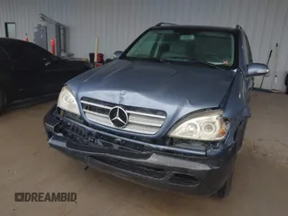 2005 Mercedes-Benz M 3.7L with VIN 4JGAB57E25A560516, listed as a IAAI auction lot 41898369 with 125,927 mi miles. Bid and sale history available at carsss.com. Image 6.