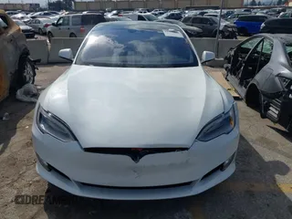 2016 Tesla Model S 90D with VIN 5YJSA1E27GF153525, listed as a IAAI auction lot 41539221 with 145,771 mi miles and . Bid and sale history available at DreamBid. Image 12.