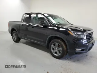 2022 Honda Ridgeline RTL with VIN 5FPYK3F52NB038976, listed as a Copart auction lot 57803425 with 33,897 mi miles and Non repairable. Bid and sale history available at DreamBid. Image 4.