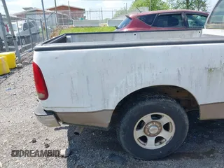 2002 Ford F-150 XL with VIN 2FTRF17W42CA29034, listed as a IAAI auction lot 42134017 with Not Provided miles and . Bid and sale history available at DreamBid. Image 6.