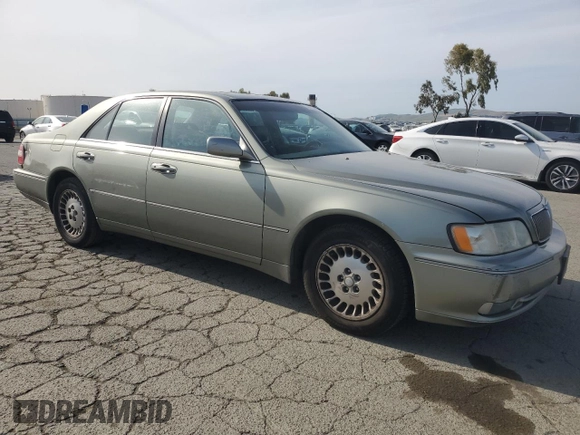2001 Infiniti Q45 Touring with VIN JNKBY31A01M101364, listed as a Copart auction lot 54859845 with 213,588 mi miles and Salvage Title. Bid and sale history available at DreamBid. Image 4.