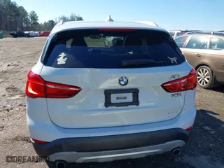 2017 BMW X1 xDrive28i with VIN WBXHT3C37H5F69725, listed as a IAAI auction lot 41588095 with 109,704 mi miles. Bid and sale history available at carsss.com. Image 16.