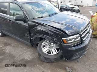 2019 Volkswagen Atlas SE z VIN 1V2UR2CA6KC580992, wystawiony jako IAAI lot #41902265 z przebiegiem 63 233 mil mil oraz . Historia ofert i sprzedaży dostępna na DreamBid. Obrazek 6.