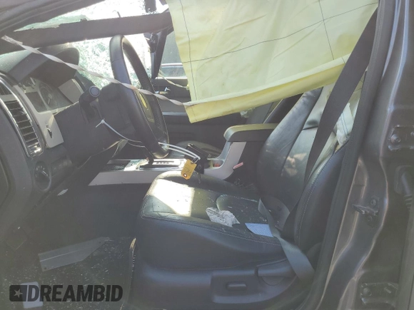 2009 Mercury Mariner Premier with VIN 4M2CU97G39KJ16748, listed as a Copart auction lot 60787005 with 191,206 mi miles and Salvage title. Bid and sale history available at DreamBid. Image 7.