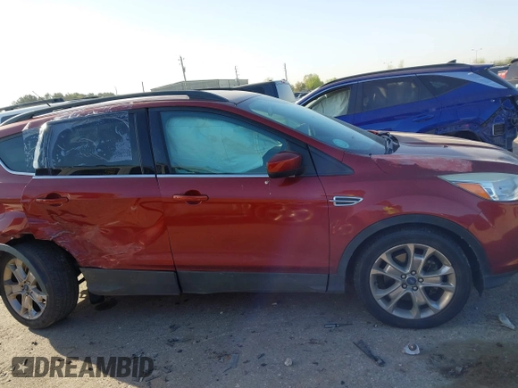 2015 Ford Escape SE with VIN 1FMCU9G93FUC32776, listed as a IAAI auction lot 41849714 with 135,875 mi miles. Bid and sale history available at carsss.com. Image 13.