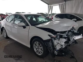 2025 Toyota Camry LE with VIN 4T1DAACK9SU112515, listed as a IAAI auction lot 41932562 with 587 mi miles and . Bid and sale history available at DreamBid. Image 1.