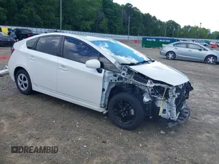 2015 Toyota Prius Four z VIN JTDKN3DU7F0418265, wystawiony jako IAAI lot #42241200 z przebiegiem 123 217 mil mil oraz . Historia ofert i sprzedaży dostępna na DreamBid. Obrazek 1.