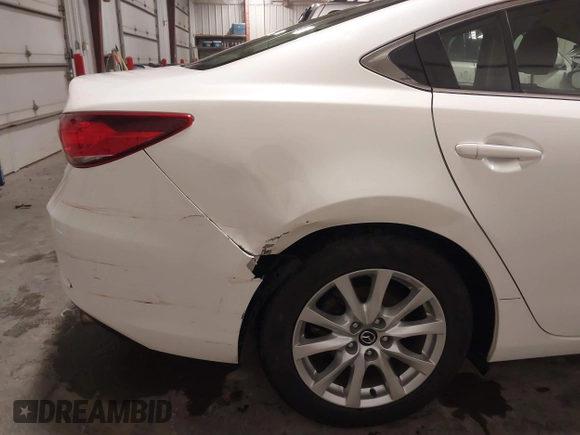 2016 Mazda Mazda6 i Sport with VIN JM1GJ1U54G1473671, listed as a IAAI auction lot 41576038 with 88,386 mi miles. Bid and sale history available at carsss.com. Image 19.