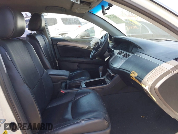 2008 Toyota Avalon XL with VIN 4T1BK36B08U274604, listed as a IAAI auction lot 41768642 with 180,335 mi miles. Bid and sale history available at carsss.com. Image 5.