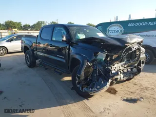 2016 Toyota Tacoma SR5 with VIN 3TMDZ5BN8GM004995, listed as a IAAI auction lot 41979497 with 91,227 mi miles. Bid and sale history available at carsss.com. Image 1.
