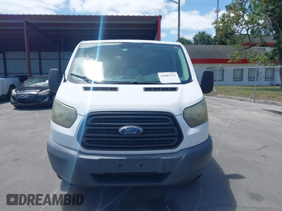 2015 Ford Transit Cargo with VIN 1FTNE1YM7FKA95206, listed as a IAAI auction lot 42083733 with 195,306 mi miles. Bid and sale history available at carsss.com. Image 12.