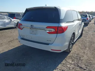 2020 Honda Odyssey Elite with VIN 5FNRL6H92LB014671, listed as a IAAI auction lot 42110389 with 104,180 mi miles and . Bid and sale history available at DreamBid. Image 4.