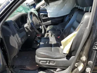 2013 Honda Ridgeline RTL z VIN 5FPYK1F5XDB010362, wystawiony jako Copart lot #50763704 z przebiegiem 134 745 mil mil oraz Szkoda całkowita • Salvage title. Historia ofert i sprzedaży dostępna na DreamBid. Obrazek 7.
