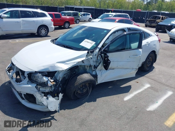 2020 Honda Civic LX with VIN 2HGFC2F61LH568767, listed as a IAAI auction lot 41909755 with 56,213 mi miles and . Bid and sale history available at DreamBid. Image 18.
