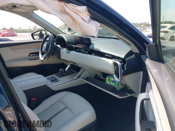 2024 Mazda CX-90 Premium Plus with VIN JM3KKEHD8R1186750, listed as a IAAI auction lot 41795353 with 5,144 mi miles and . Bid and sale history available at DreamBid. Image 5.