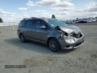 2011 Toyota Sienna XLE with VIN 5TDDK3DC2BS028058, listed as a Copart auction lot 54374215 with 216,905 mi miles and Salvage Title. Bid and sale history available at DreamBid. Image 14.