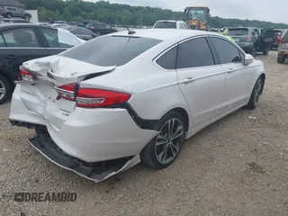 2017 Ford Fusion Titanium with VIN 3FA6P0D96HR239830, listed as a IAAI auction lot 42741998 with 116,951 mi miles and . Bid and sale history available at DreamBid. Image 4.