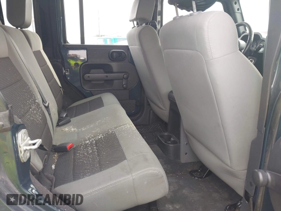 2008 Jeep Wrangler Unlimited X with VIN 1J4GB39138L518050, listed as a IAAI auction lot 41609541 with 226,752 mi miles and . Bid and sale history available at DreamBid. Image 8.