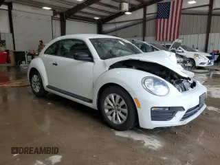 2017 Volkswagen Beetle Fleet with VIN 3VWF17AT9HM613412, listed as a Copart auction lot 62344475 with 52,340 mi miles and Salvage title. Bid and sale history available at DreamBid. Image 4.