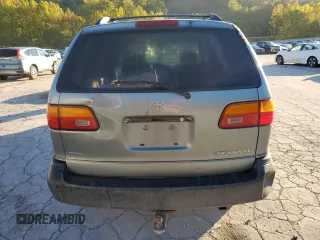 1999 Toyota Sienna LE with VIN 4T3ZF13C4XU137126, listed as a Copart auction lot 75205074 with 0 mi miles and Salvage Title. Bid and sale history available at carsss.com. Image 6.