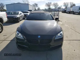 2012 BMW 6 Series 650i z VIN WBALZ3C51CDL72422, wystawiony jako Copart lot #87447914 z przebiegiem 115 376 mil mil oraz Szkody całkowita. Historia ofert i sprzedaży dostępna na DreamBid. Obrazek 5.