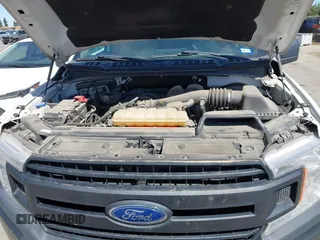 2018 Ford F-150 XL with VIN 1FTMF1CB1JKC01852, listed as a IAAI auction lot 42449112 with 99,105 mi miles and . Bid and sale history available at DreamBid. Image 10.