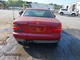 1999 Mercedes-Benz SLK-Class with VIN WDBKK47F0XF088123, listed as a IAAI auction lot 41991751 with 275,370 mi miles. Bid and sale history available at carsss.com. Image 16.