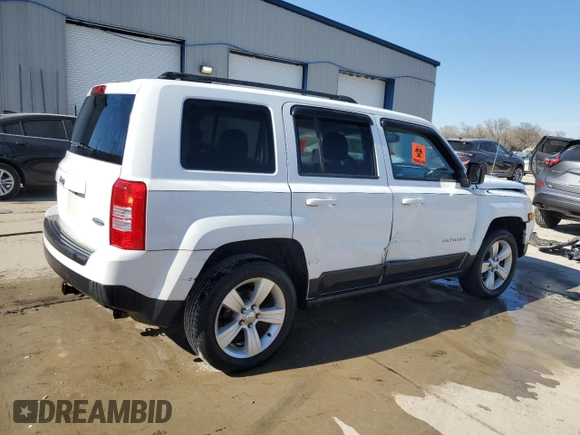 2015 Jeep Patriot High Altitude with VIN 1C4NJRFB5FD169156, listed as a Copart auction lot 50393335 with 122,233 mi miles and Salvage title. Bid and sale history available at DreamBid. Image 3.