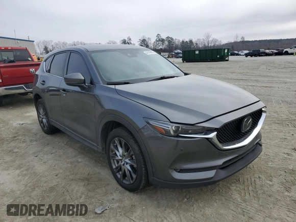 2019 Mazda CX-5 Signature with VIN JM3KFBEY3K0609305, listed as a Copart auction lot 44146455 with 33,104 mi miles and Salvage Title. Bid and sale history available at carsss.com. Image 4.