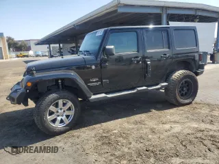 2012 Jeep Wrangler Unlimited Altitude with VIN 1C4HJWEG9CL209278, listed as a Copart auction lot 56016835 with 134,807 mi miles and Salvage title. Bid and sale history available at DreamBid. Image 1.