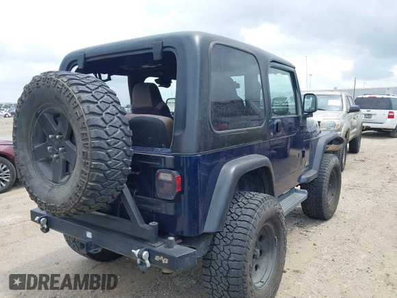 2005 Jeep Wrangler X with VIN 1J4FA39S15P320367, listed as a IAAI auction lot 42114102 with 142,132 mi miles and . Bid and sale history available at DreamBid. Image 4.