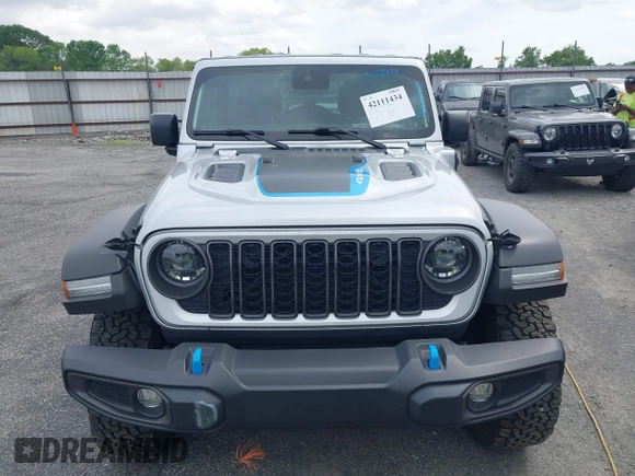 2024 Jeep Wrangler Rubicon with VIN 1C4RJXR61RW224506, listed as a IAAI auction lot 42111434 with 33,689 mi miles and . Bid and sale history available at DreamBid. Image 12.