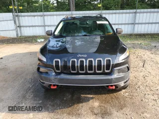2015 Jeep Cherokee Trailhawk z VIN 1C4PJMBS6FW652001, wystawiony jako Copart lot #62344785 z przebiegiem 165 473 mil mil oraz Szkoda całkowita • Salvage title. Historia ofert i sprzedaży dostępna na DreamBid. Obrazek 5.